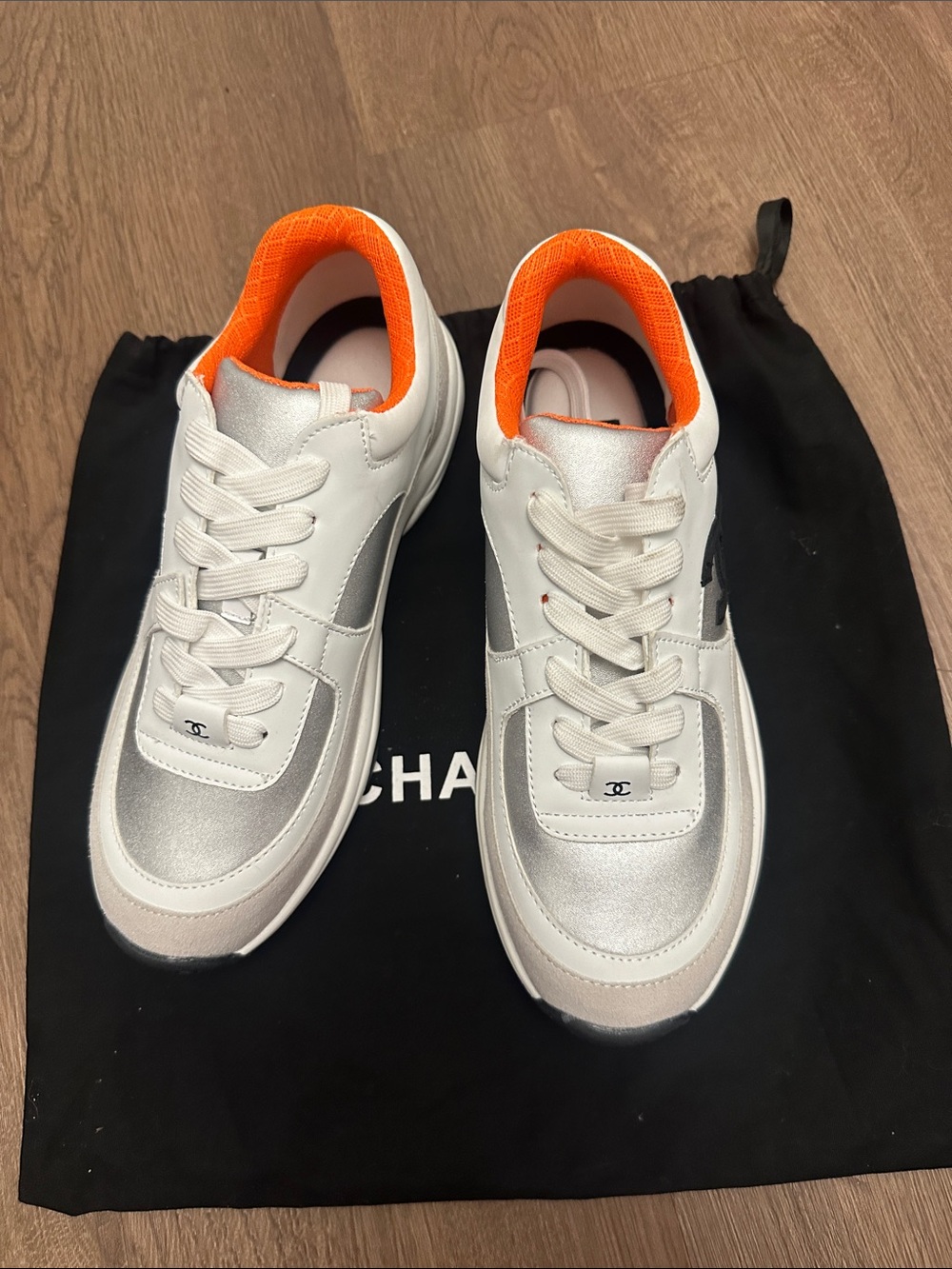 CC White and Silver Sneakers with Orange Lining